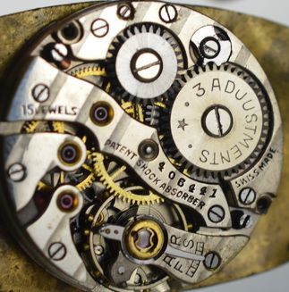 fig 1. 1929 JW Benson Silver Tonneau Wristwatch 