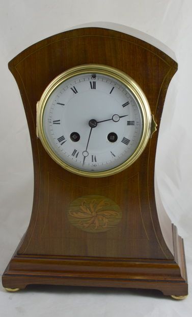 An Edwardian Mahogany Mantle Clock