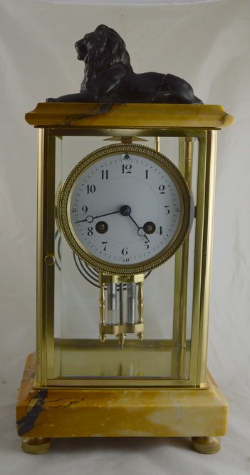 A French Marble & Brass Four Glass Mantle Clock
