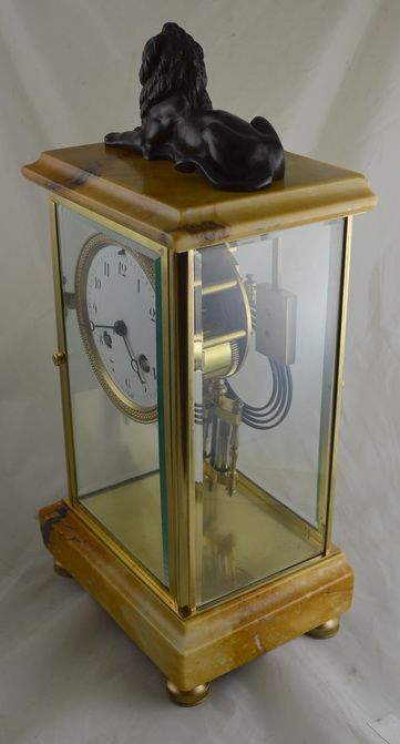 fig 1. A French Marble & Brass Four Glass Mantle Clock