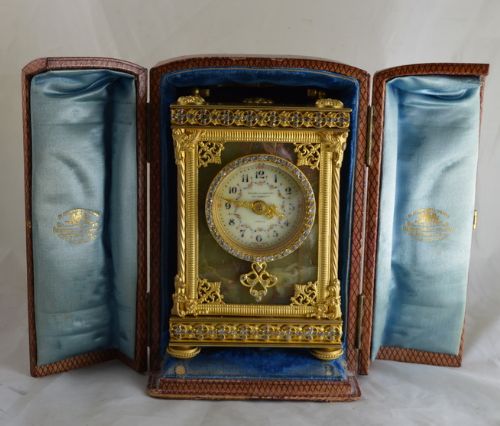 A Rare Onyx and Gilt Jewelled Goldsmiths of London Carriage Clock