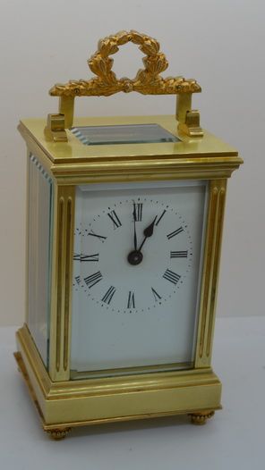 fig 1. Carriage Clock with gilded floral handle