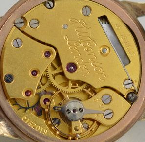 fig 1. 1954 9K Gold JW Benson Wristwatch