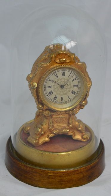 A Rare Small Georgian Clock Under a Dome