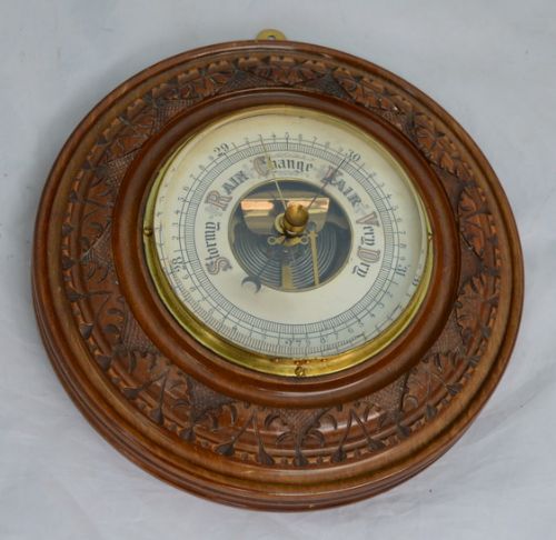 A Victorian Carved Aneroid Barometer