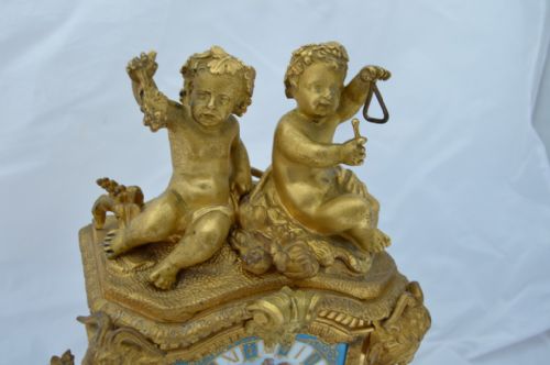 fig 1. Porcelain Panelled Gilt Bronze Mantel Clock