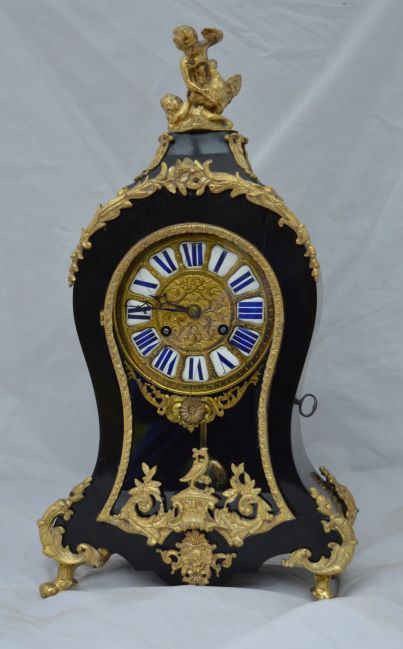 Honore Pons Ebonised and Ormolu Mantel Clock