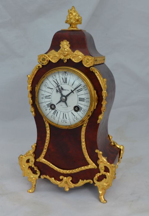 A Red Tortoishell Mantel Clock