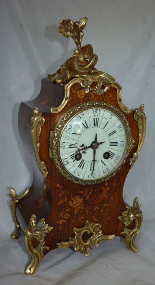 A French Rosewood Marquetry Inlaid Mantel Clock