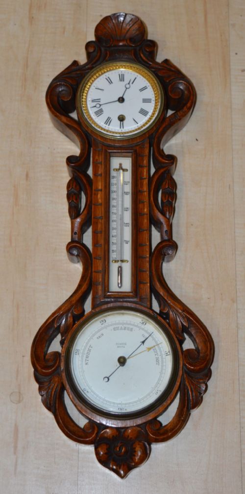 A Victorian Wall Clock Barometer