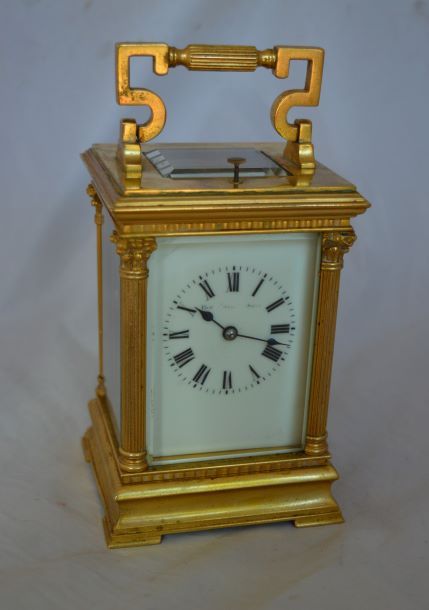 A French Gilded Cased Strike/repeat Carriage Clock