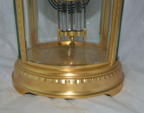 fig 1. An Oval Gilded Four Glass Mantel Clock