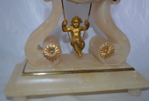 fig 1. Farcot of Paris Swinging Cherub Mantel Clock