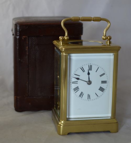 A Striking Carriage Clock & Box