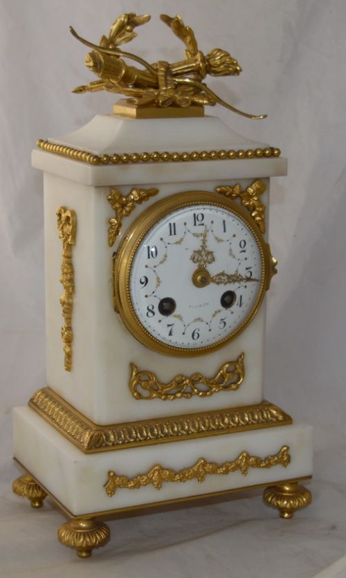A White Marble and Ormolu French Mantel Clock