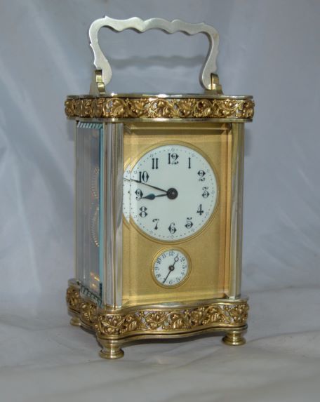 A Silvered and Gilt Carriage Clock