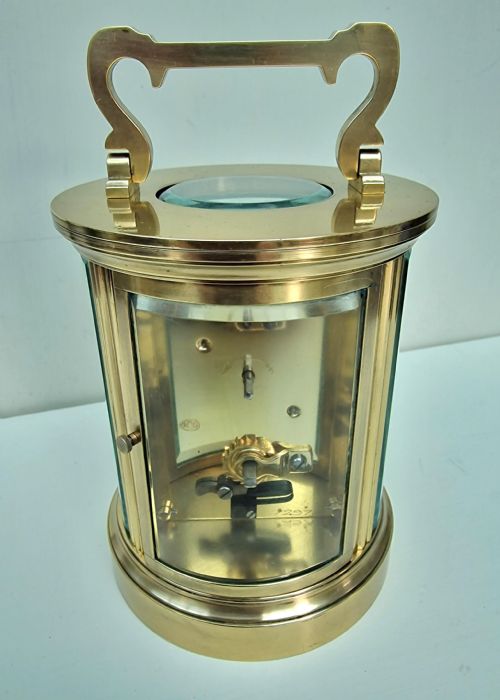 fig 1. An Oval Cased Carriage Clock