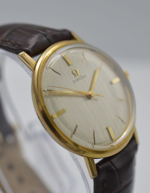 fig 1. 1963 Omega Wristwatch with Brushed Steel Dial