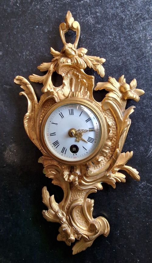 A Miniature Cartel Wall Clock
