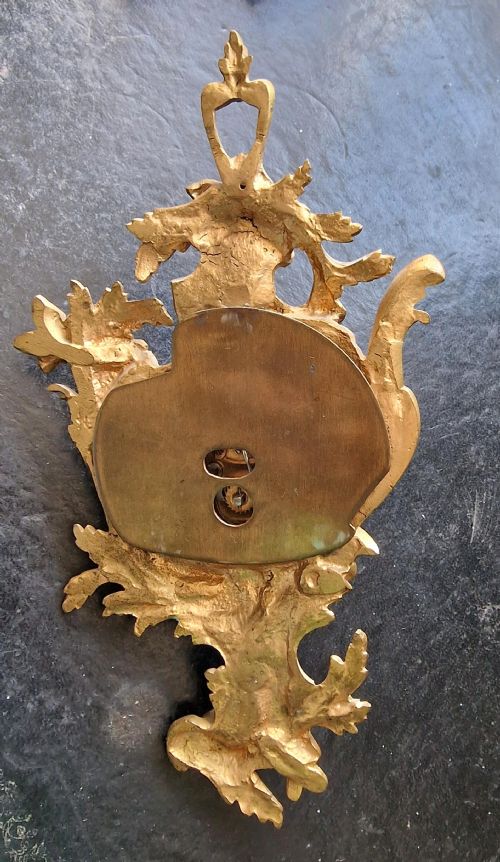 fig 1. A Miniature Cartel Wall Clock