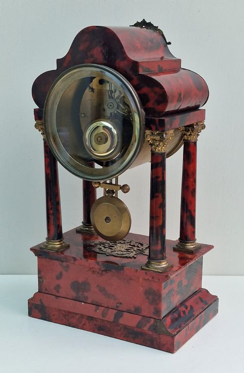 fig 1. A Red Tortoishell Portico Clock