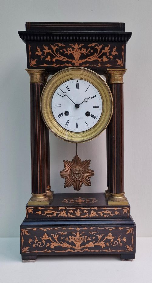 A Portico Marquetry Inlaid Mantel Clock