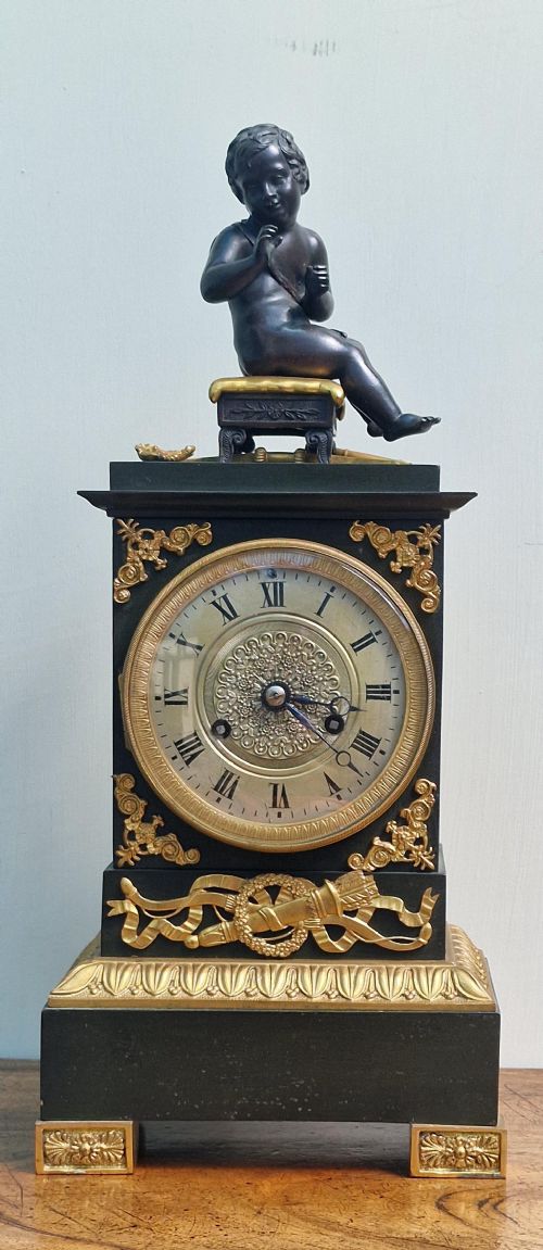 A Bronze & Gilt Mantel Clock