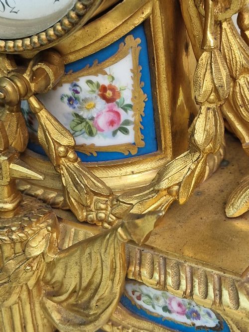 fig 1. A Gilt Bronze Porcelain Panel Mantel Clock