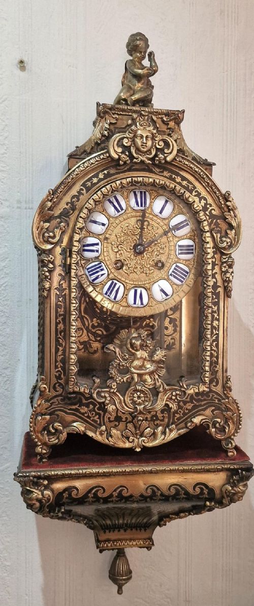 A FRENCH BOULLE TORTOISE SHELL MANTEL CLOCK WALL BRACKET