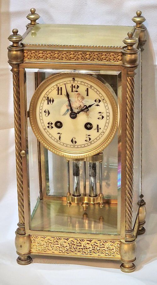 A Four Glass Mantel Clock, Cherub Dial
