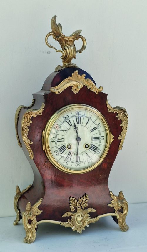 A Gilt Mounted French Mantel Clock