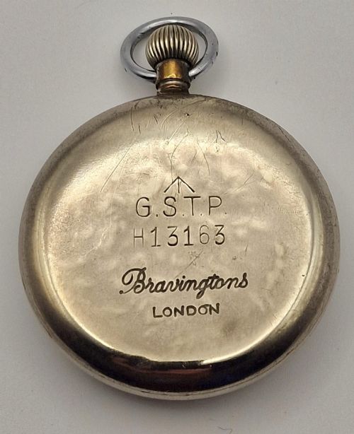 fig 1. A vintage Buren Grand Prix Swiss pocket watch featuring a white dial, black Arabic numerals, luminous hands, a sub-seconds dial, and a silver-tone chrome case.