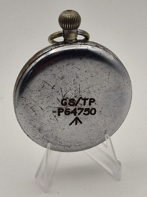 fig 1. A round Helvetia military pocket watch featuring a white dial with bold black numbers, a sub-seconds dial, and a worn metal casing.