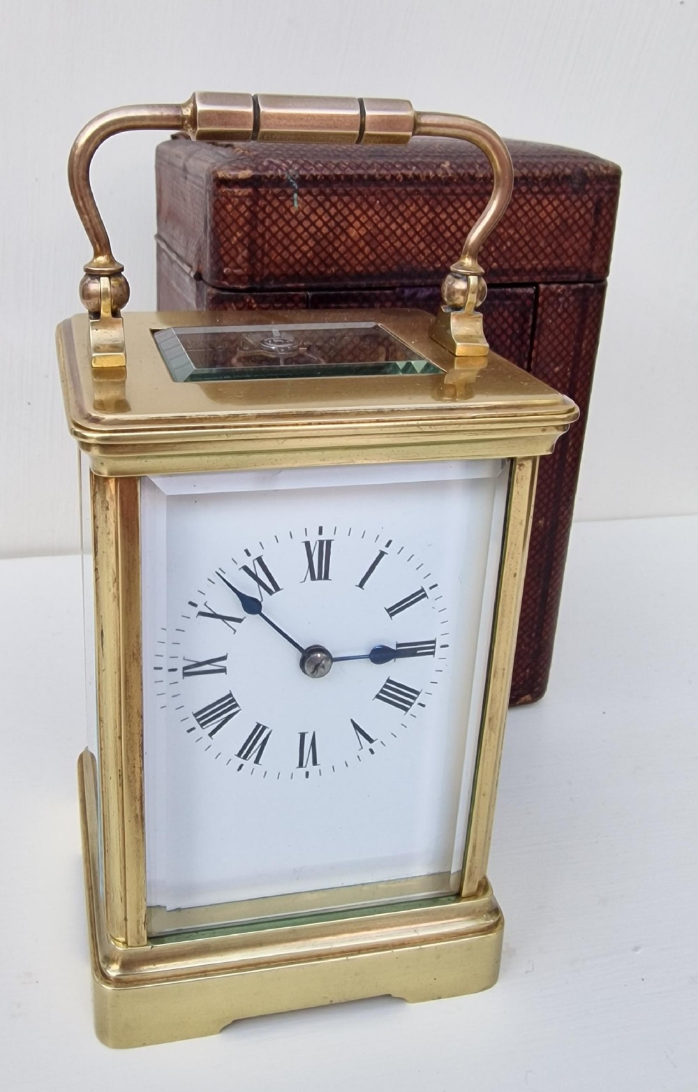 A Striking Carriage Clock & Original Box