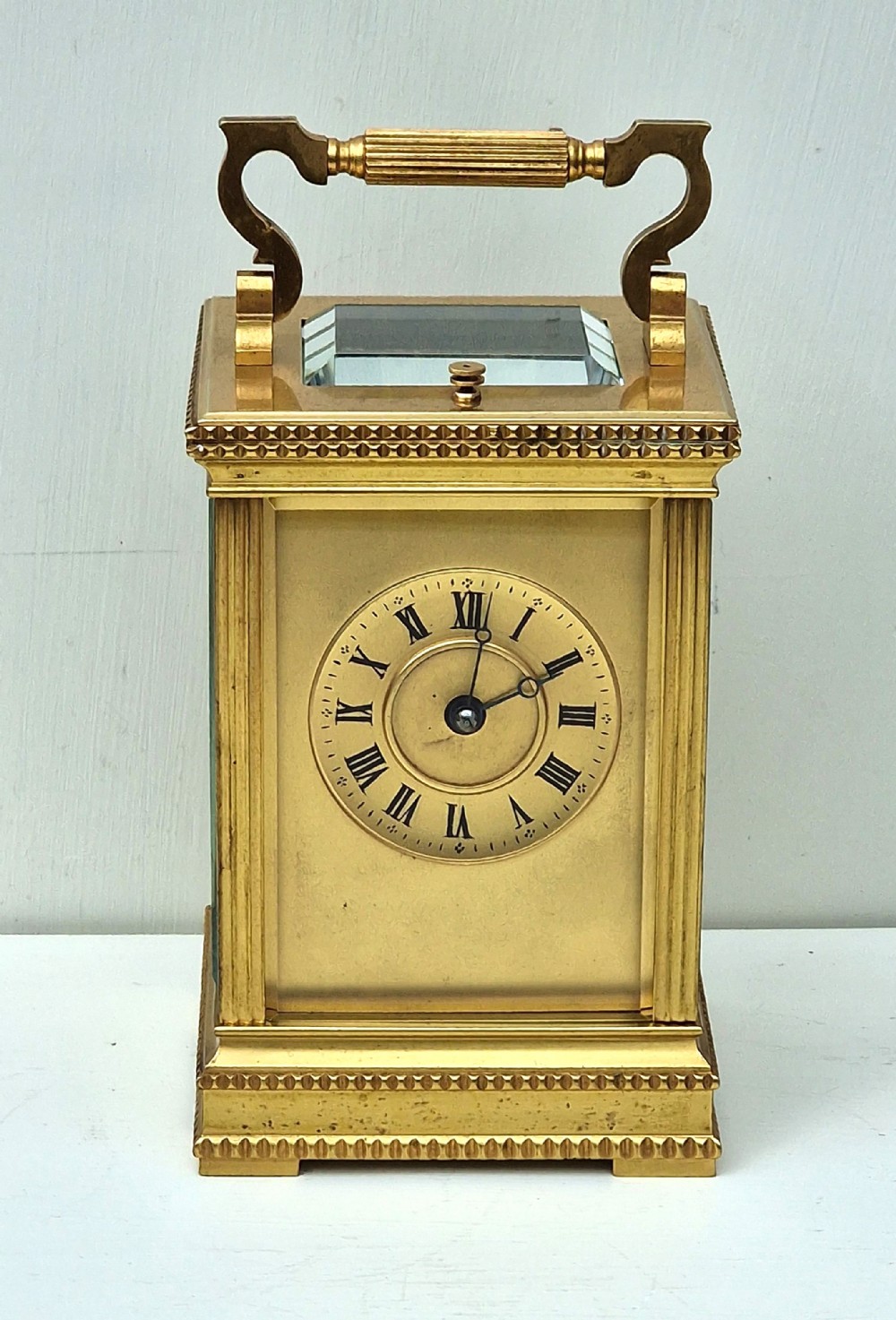 A Striking & Repeating Gilded Carriage Clock