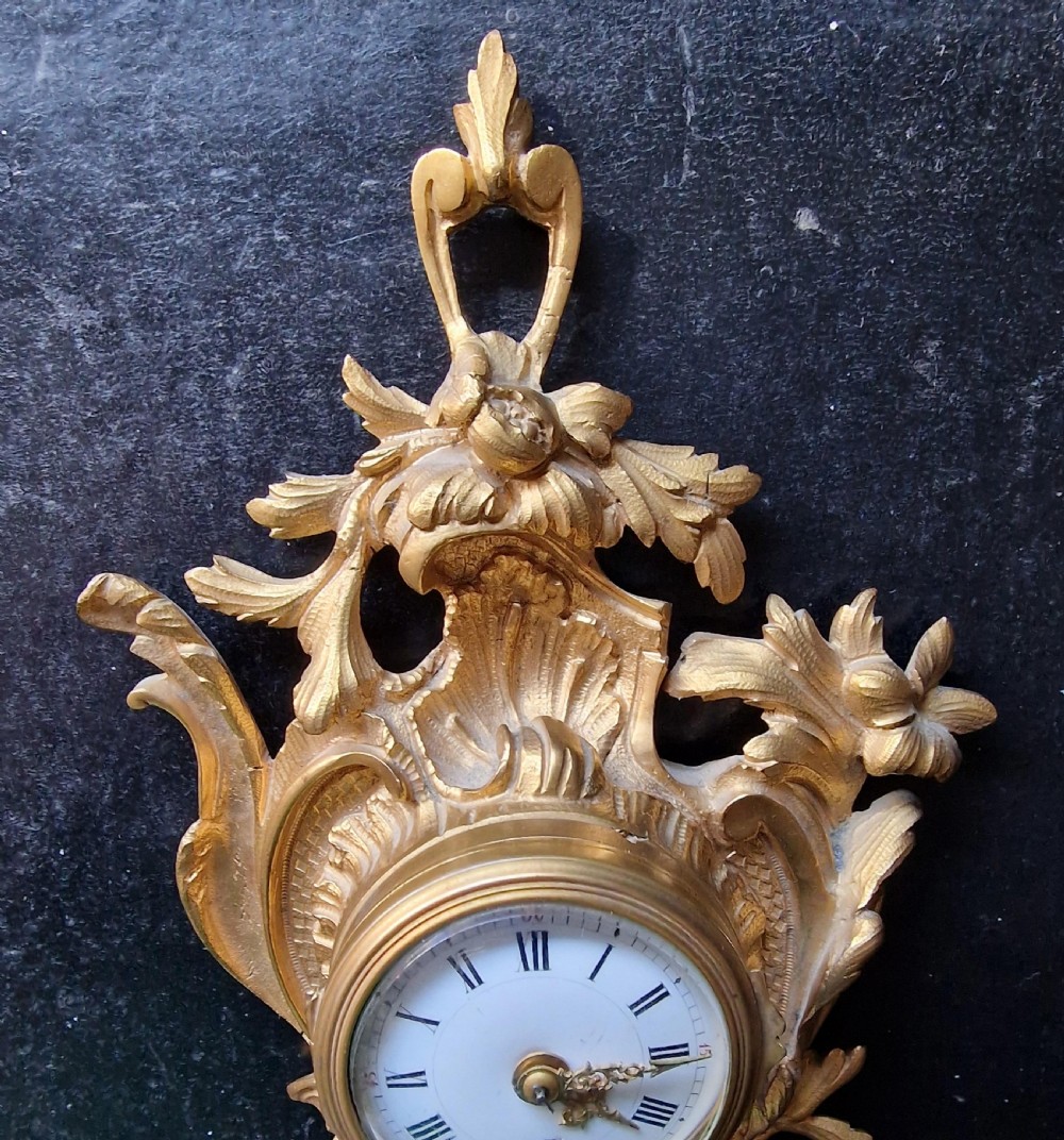 A Miniature Cartel Wall Clock View V