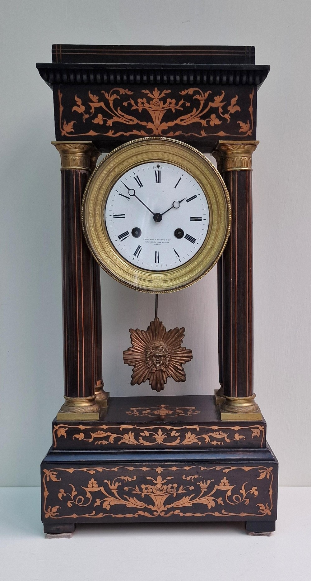 A Portico Marquetry Inlaid Mantel Clock