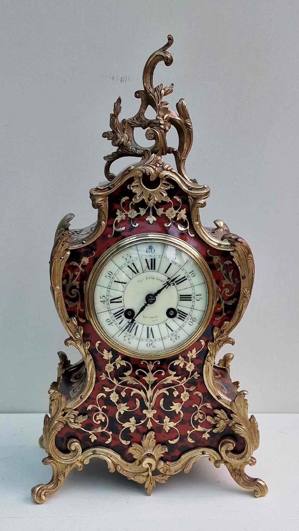 A Boulle Inlaid Mantel Clock