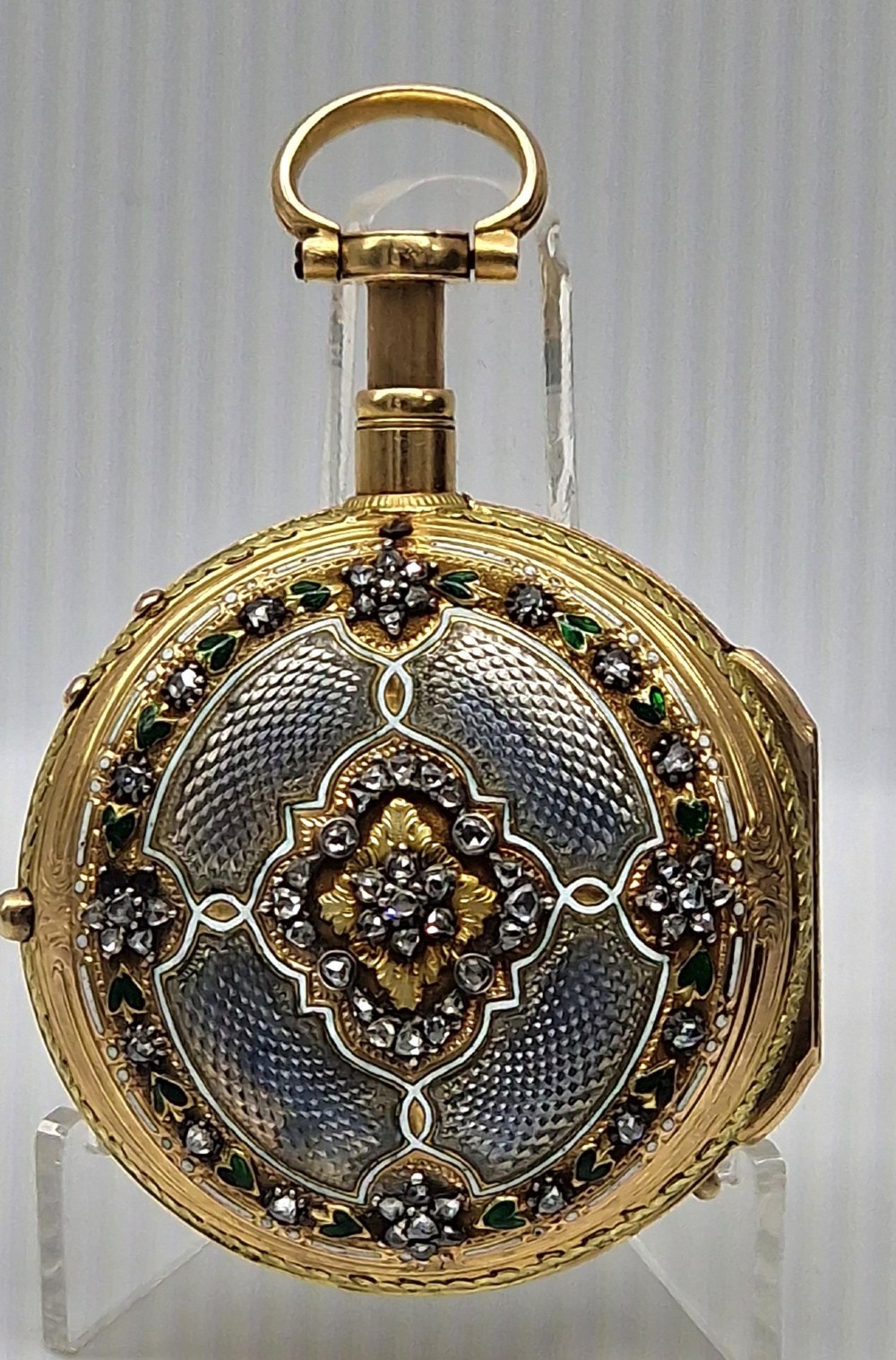An eighteenth-century French gold quarter repeating pocket watch featuring a white enamel dial with Roman numerals, ornamental hands, and a jewel-encrusted bezel. View II