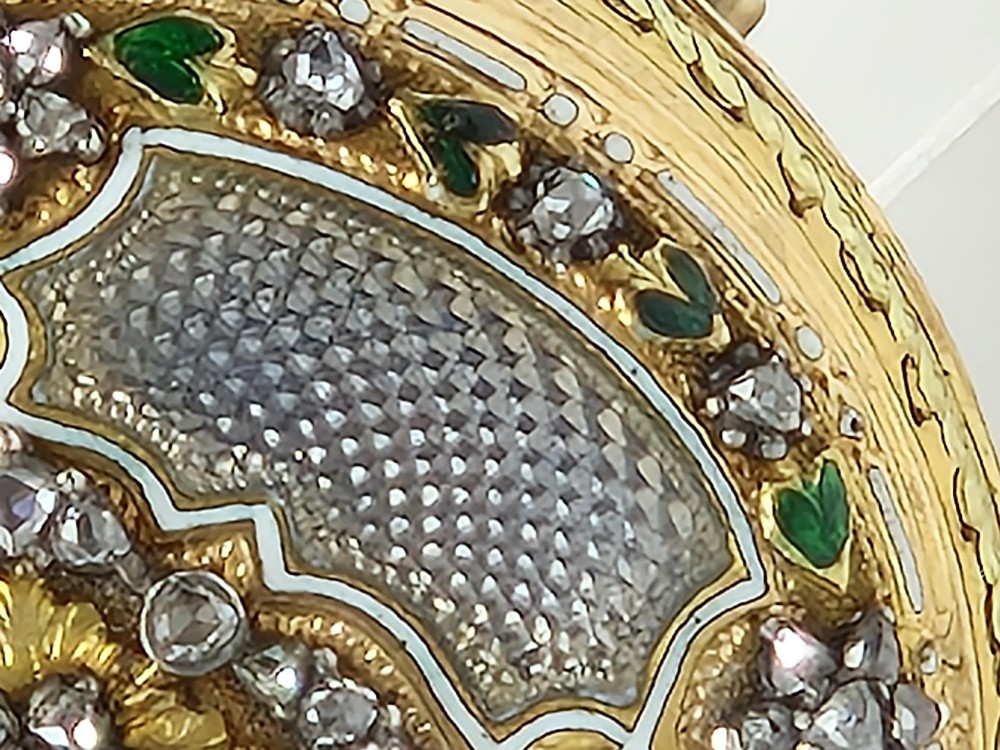 An eighteenth-century French gold quarter repeating pocket watch featuring a white enamel dial with Roman numerals, ornamental hands, and a jewel-encrusted bezel. View IV