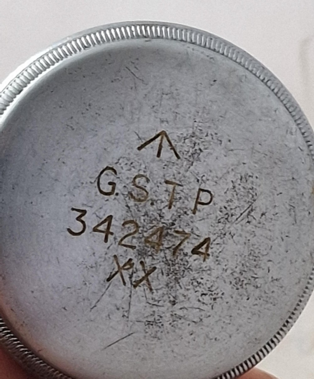 An Elgin military pocket watch with a black dial, luminous Arabic numerals, a sub-seconds dial, and a silver-tone metal case. View II
