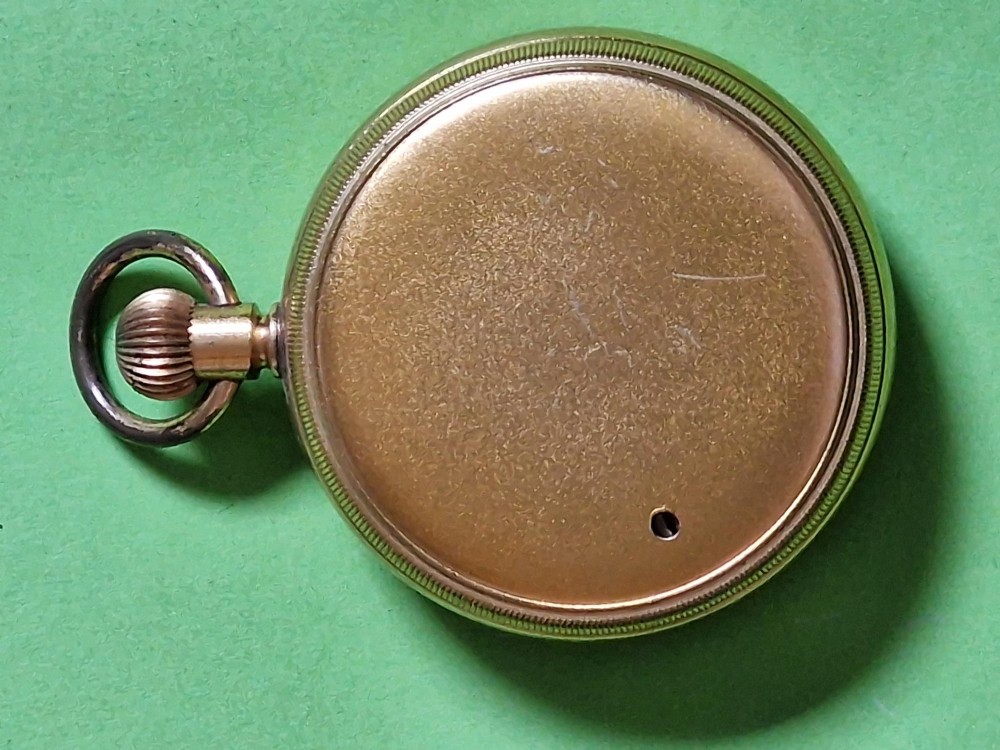 An antique pocket-watch style aneroid barometer featuring a gilt brass case, top suspension ring, and a white dial marked with barometric and altitude scales. View II