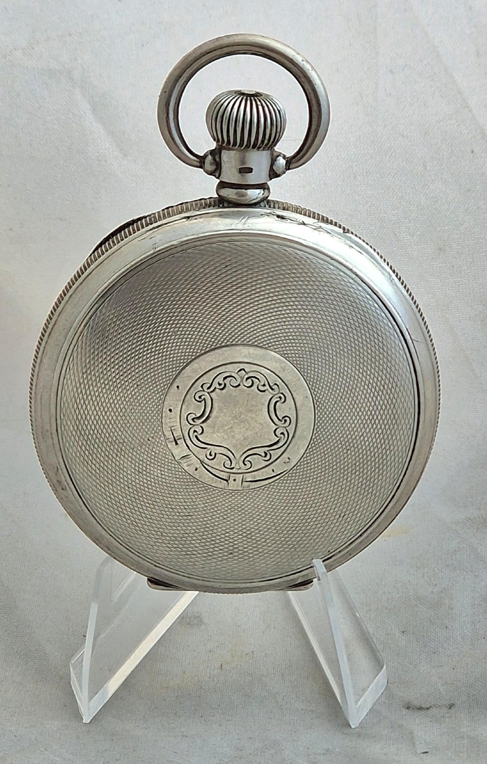 An open-face silver Buren pocket watch featuring a white enamel dial with Roman numerals and a small seconds sub-dial. View II