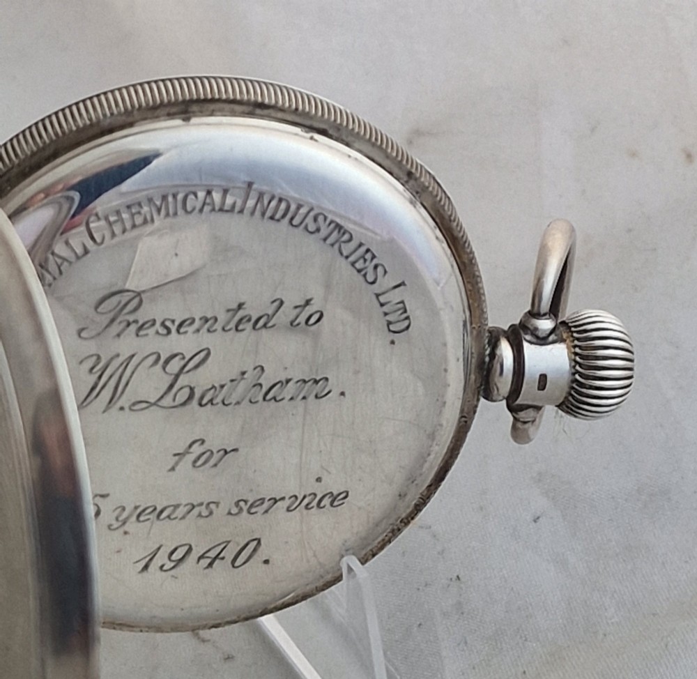 An open-face silver Buren pocket watch featuring a white enamel dial with Roman numerals and a small seconds sub-dial. View IV