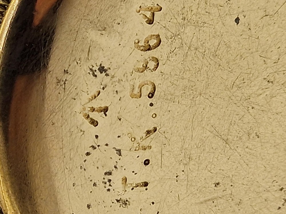 An open face Elgin pocket watch with a textured gold-coloured case, white enamel dial, black Roman numerals, steel hands, and a sub-seconds dial. View IV