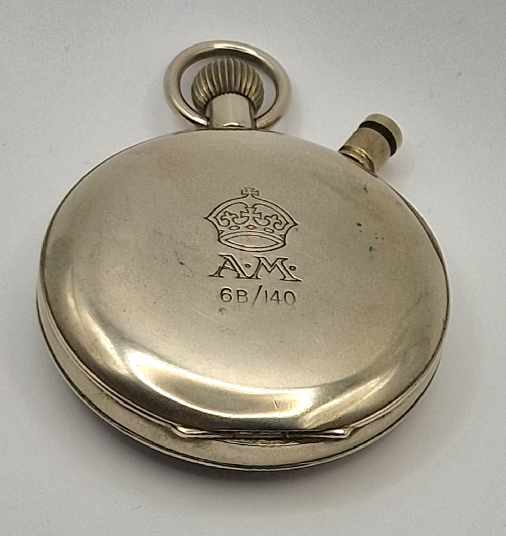 An open-face mechanical Air Ministry pocket stopwatch featuring a silver-coloured metal case, white enamel dial with black numerical markings, and two sub-dials. View II