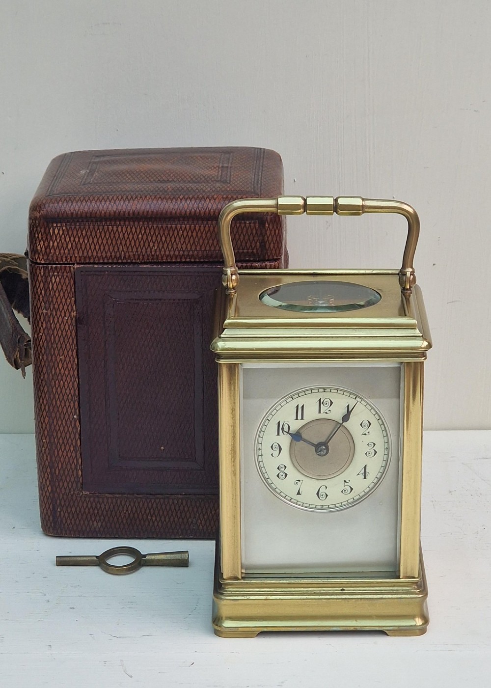 A Striking Carriage Clock & Box