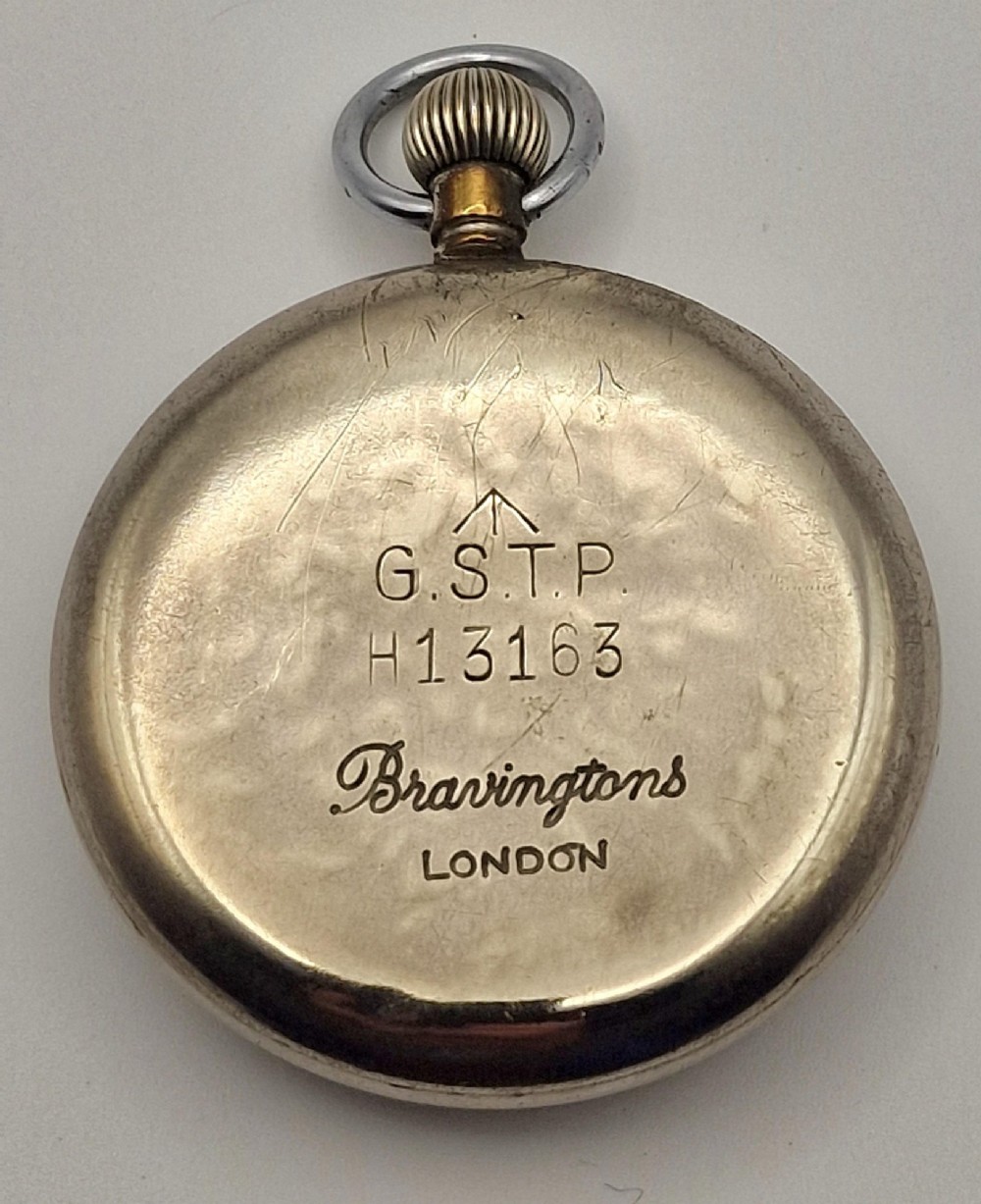 A vintage Buren Grand Prix Swiss pocket watch featuring a white dial, black Arabic numerals, luminous hands, a sub-seconds dial, and a silver-tone chrome case. View II