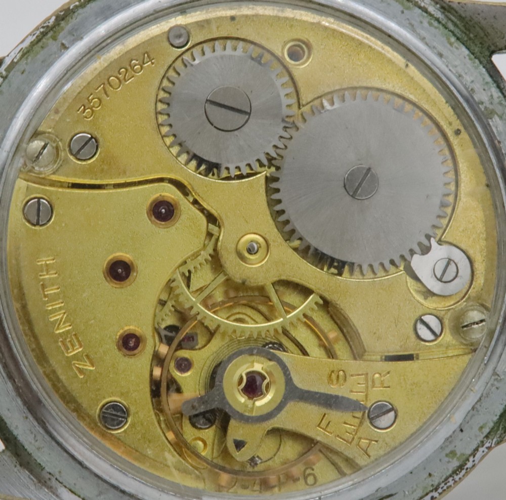 A 1950s Zenith Sporto mechanical wristwatch featuring a grey dial, Arabic numeral hour markers, a sub-seconds dial, and a brown leather strap. View VII
