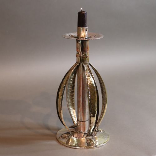 an arts and crafts candlestick by a j seward birmingham - CATEGORY: ANTIQUE LIGHTING - DATED 1910